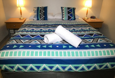 Double bed and bedspread photo
